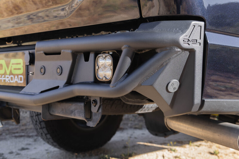 Ford F-150 Rear Bumper - DV8 Offroad - Tube design, Single exhaust models - Micro-texture black powder coat - `21-`26
